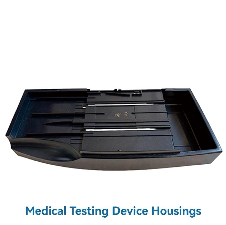 Medical testing device housing tray
